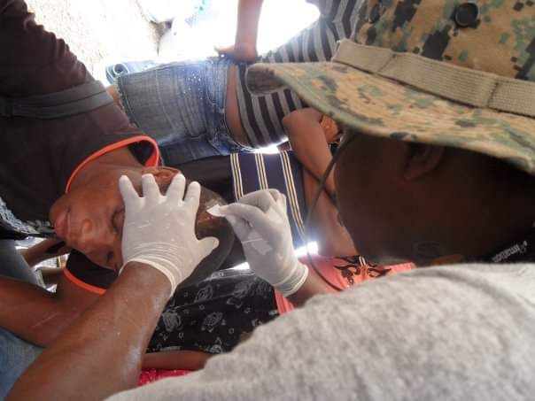 Emergency medical aid scene showing humanitarian care in action