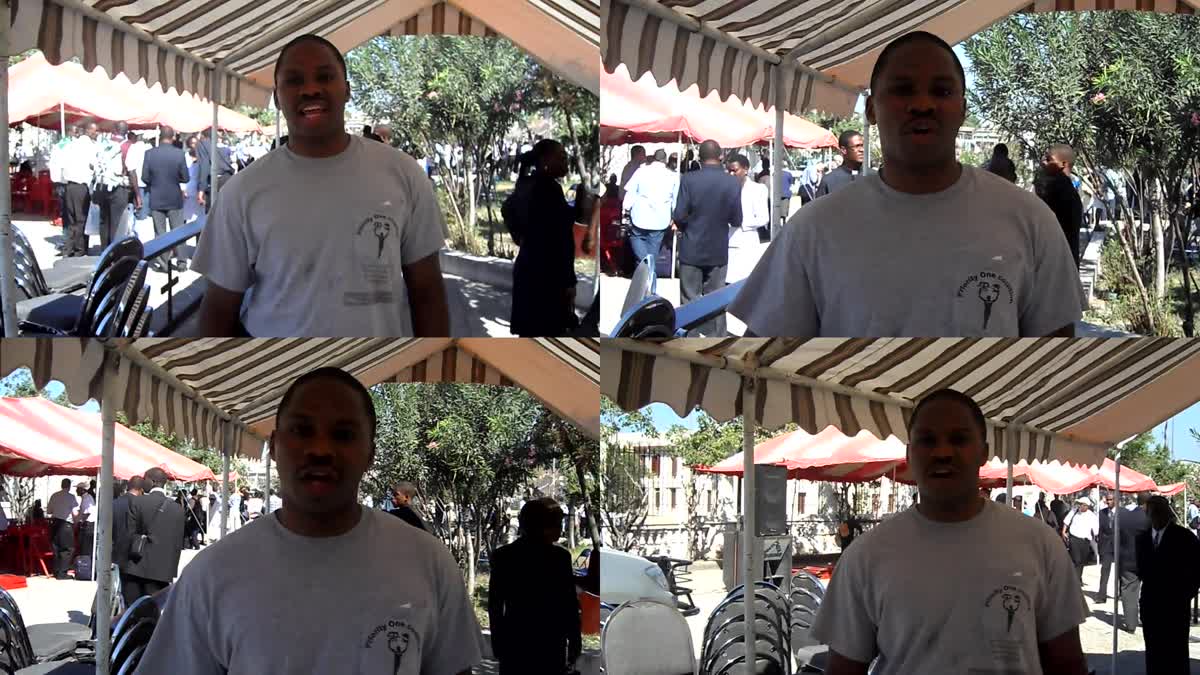 Leader speaking during Haiti field gathering